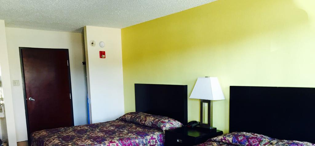 Executive Inn Groves Zimmer foto