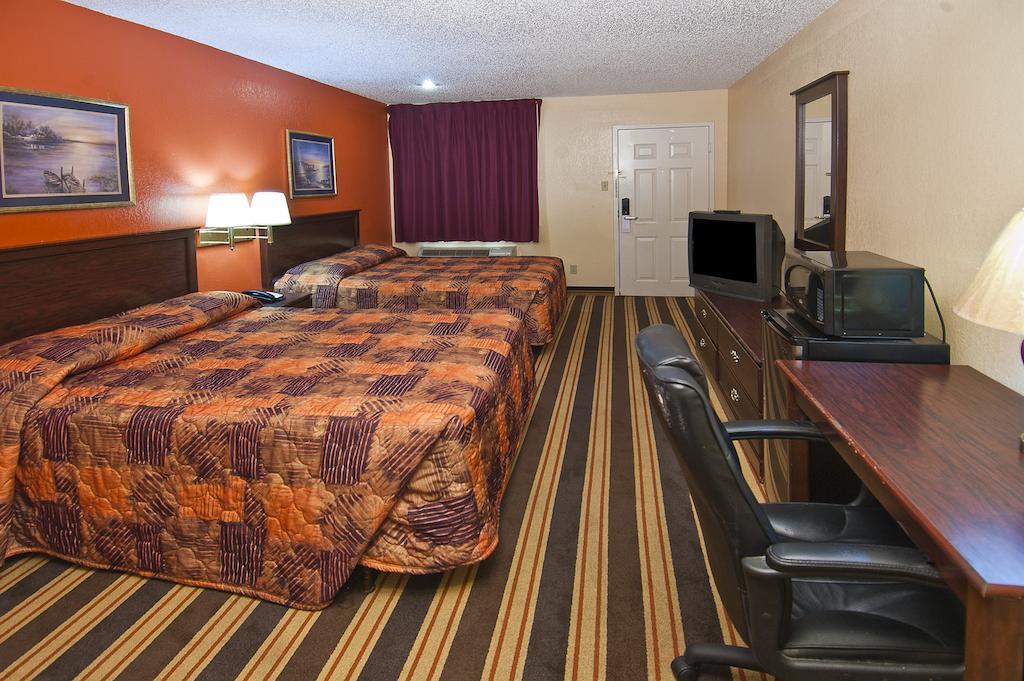 Executive Inn Groves Zimmer foto